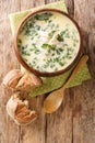 Tasty Cullen skinkÃÂ is a classic Scottish smoked fish soup with velvety leeks and potato closeup on the plate. Vertical top view